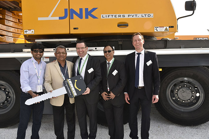 Indian crane contractor JNK Lifters takes delivery of Liebherr LTM 1250-5.1 mobile crane at the Bauma Conexpo India