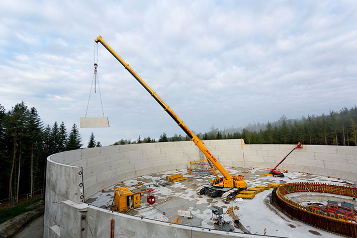 Liebherr LTR 1220 telescopic crawler crane builds water basins for innovative energy storage system 