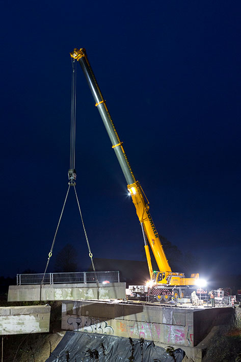 Liebherr mobile cranes successfully complete final bridge dismantling job in the dark and fog