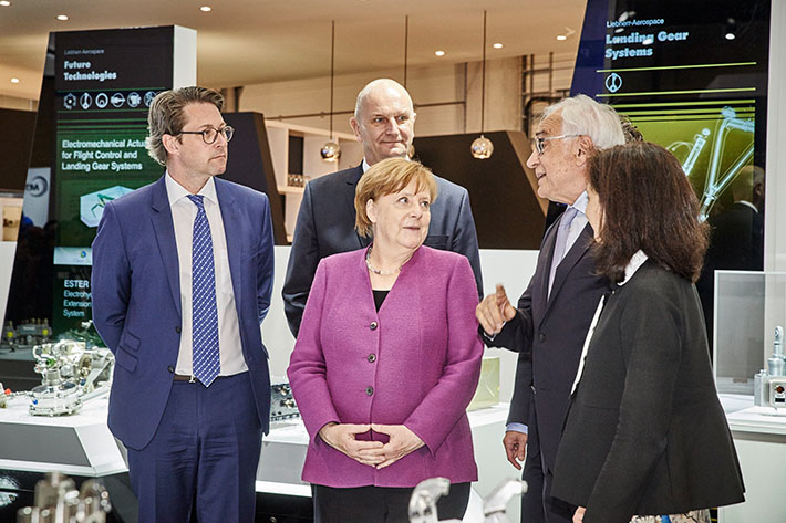 German Chancellor Merkel visits Liebherr at ILA