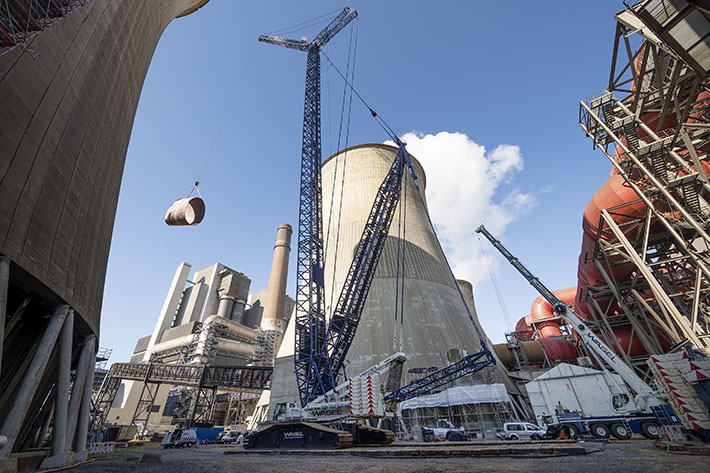 Liebherr crawler crane in action inside giant cooling tower