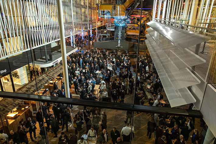 Liebherr employees celebrate the start of Bauma 2022