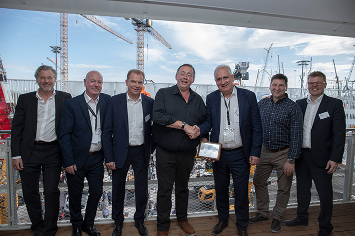 JST Services and Liebherr celebrate 20-year partnership at Bauma
