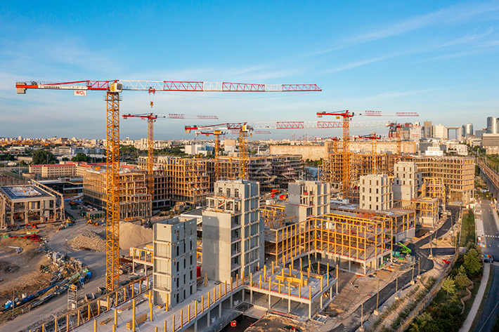 Ten Liebherr tower cranes are helping to build the largest timber campus in Europe
