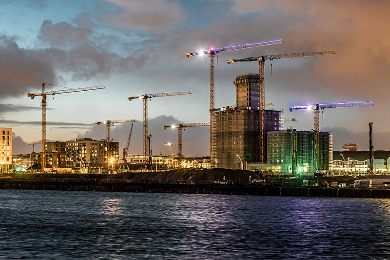 Construction of Germany's tallest timber high-rise underway with the help of Liebherr fibre rope cranes