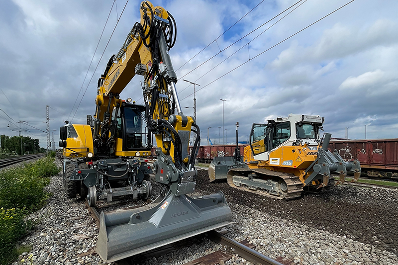 Präzision im Gleisbau – Weichenverlegung mit Zweiwegebagger und Planierraupe