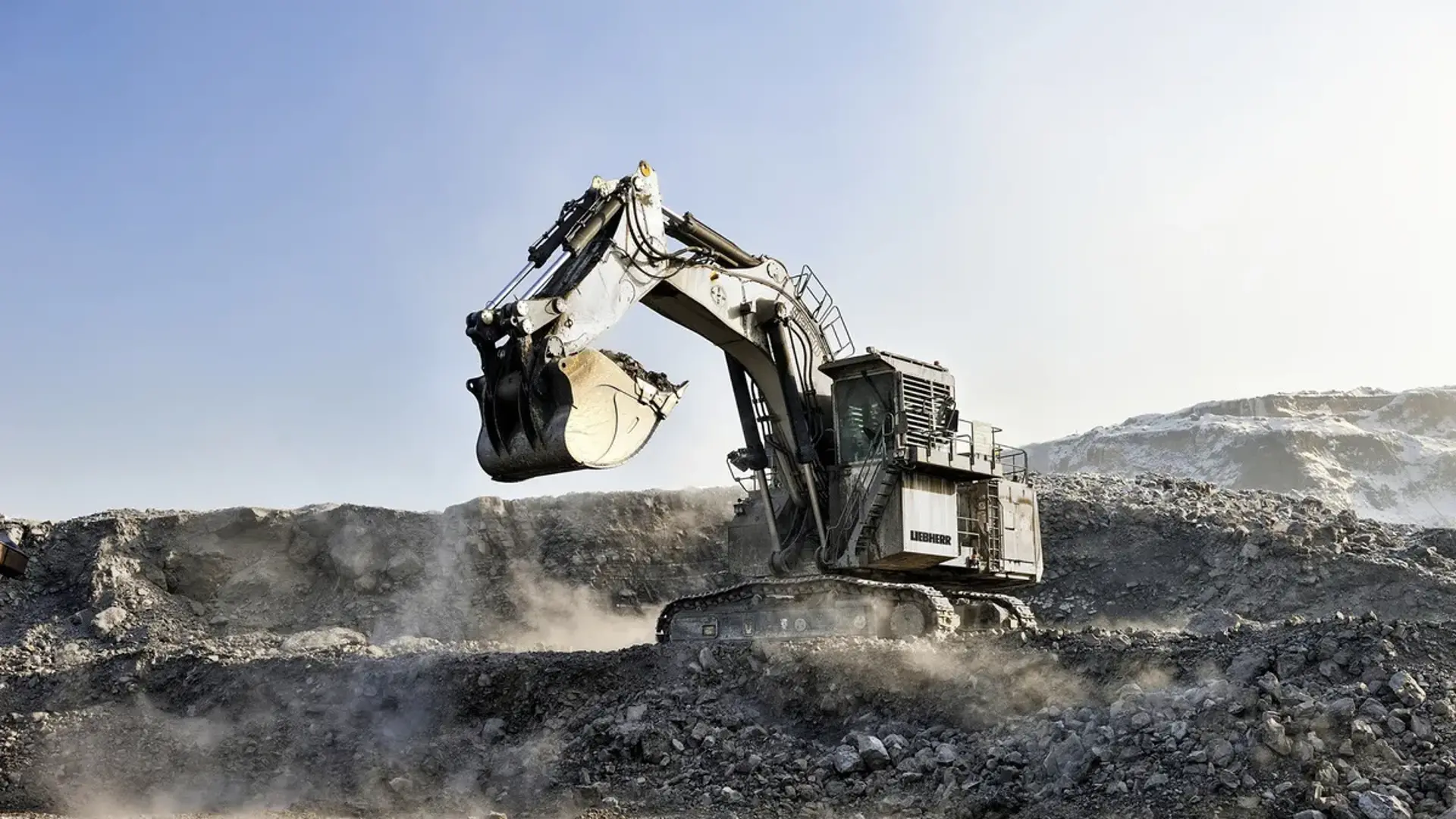 Huge mining excavator works in mine