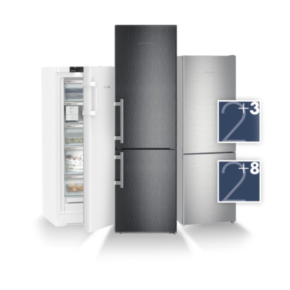 White freezer with open door, black fridge-freezer with closed door, and smaller silver fridge-freezer with closed door, next to 2+3 and 2+8 icons depicting available extended guarantees