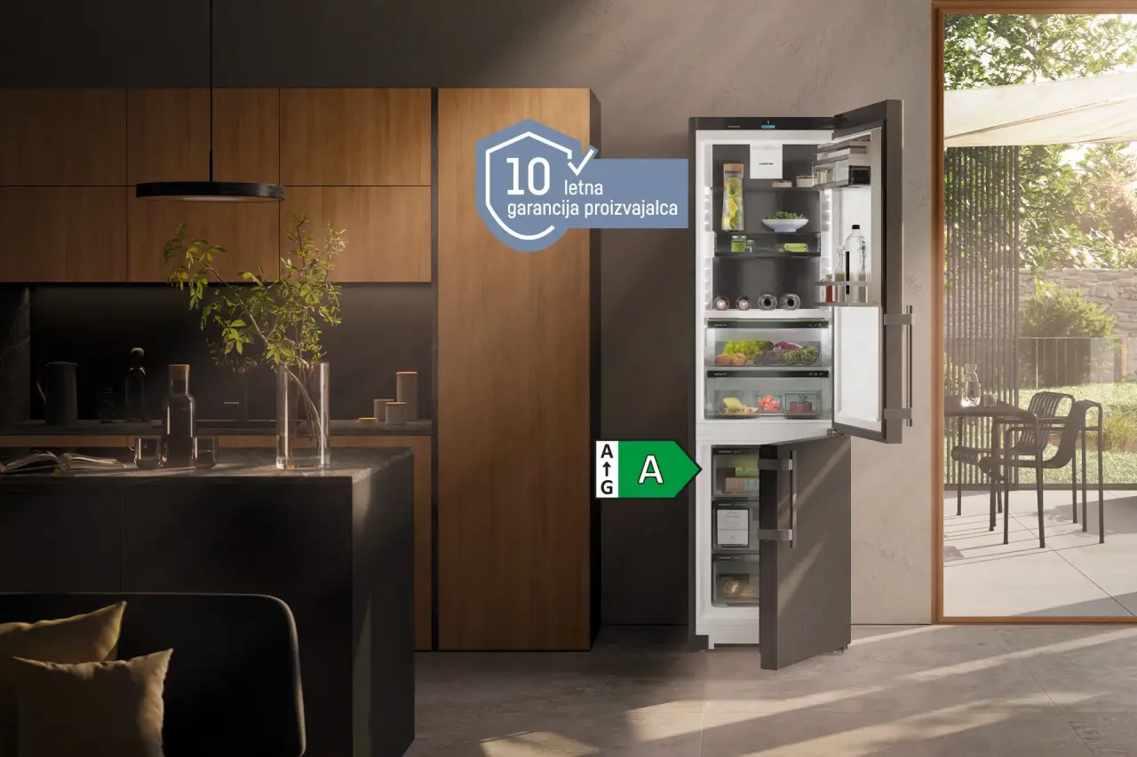 Freestanding fridge-freezer in a kitchen with 10-year Icon manufacturer's guarantee and A energy label