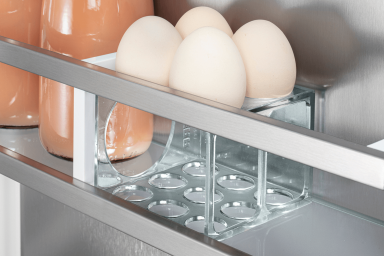 Fridge door with an organisational system holding eggs