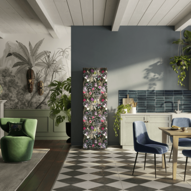 Modern homely kitchen with dark tones and a flowery pattern fridge