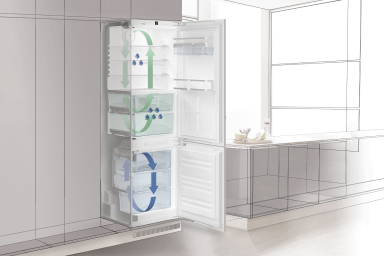 Close up of an animation of a fridge freezer with multiple arrows showing that the air circulation is different in the fridge and freezer 