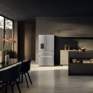Closed Liebherr French door American-style fridge-freezer in stainless steel, set in a modern kitchen.