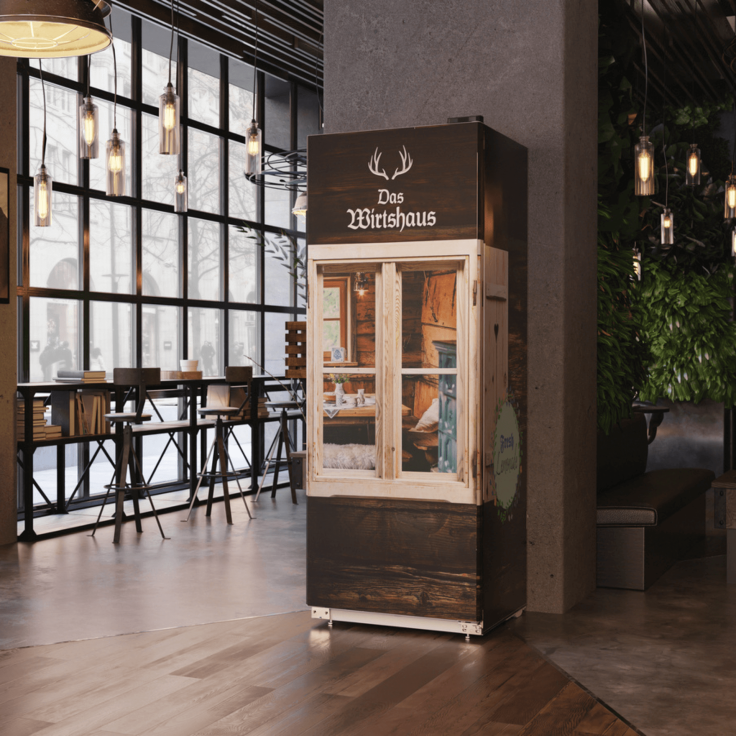 Large branded fridge positioned centrally in a restaurant environment.