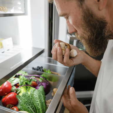 Mikkel Karstad BioFresh drawer Mikkel Karstad opening a BioFresh drawer in his fridge-freezer and smelling his fresh mushrooms from his filled Liebherr BioFresh drawer