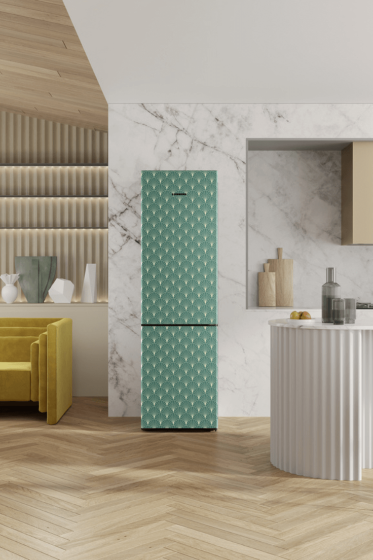 Green MyStyle with dots on in a modern marbled kitchen