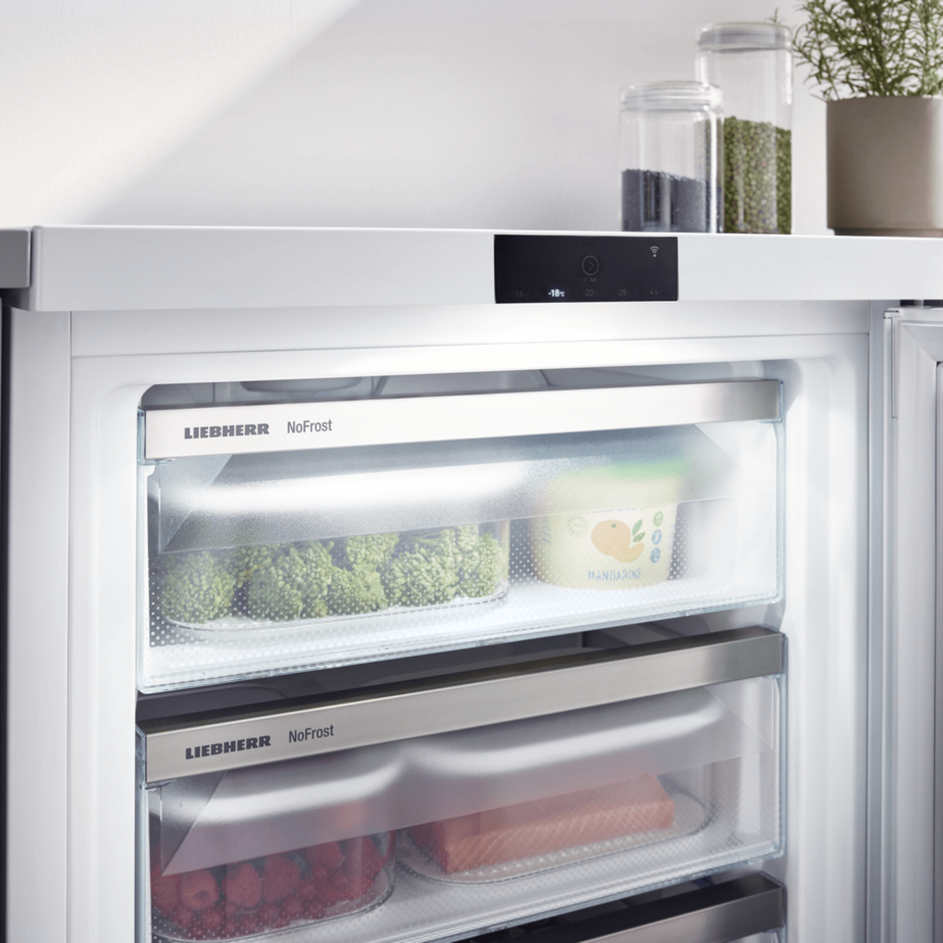 Open door under counter appliance with NoFrost freezer drawers