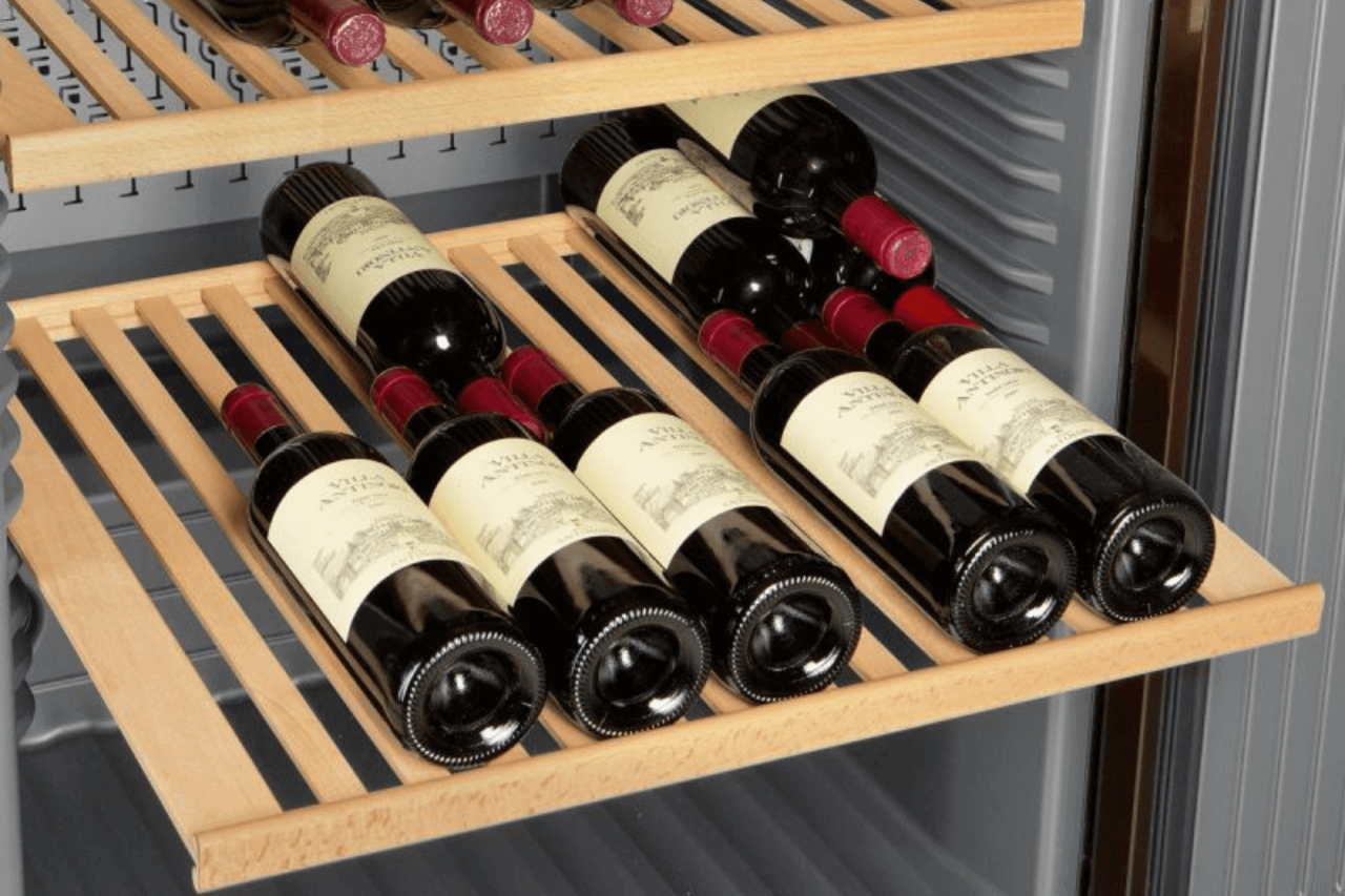 Close up of wine appliances on display on a wooden shelf