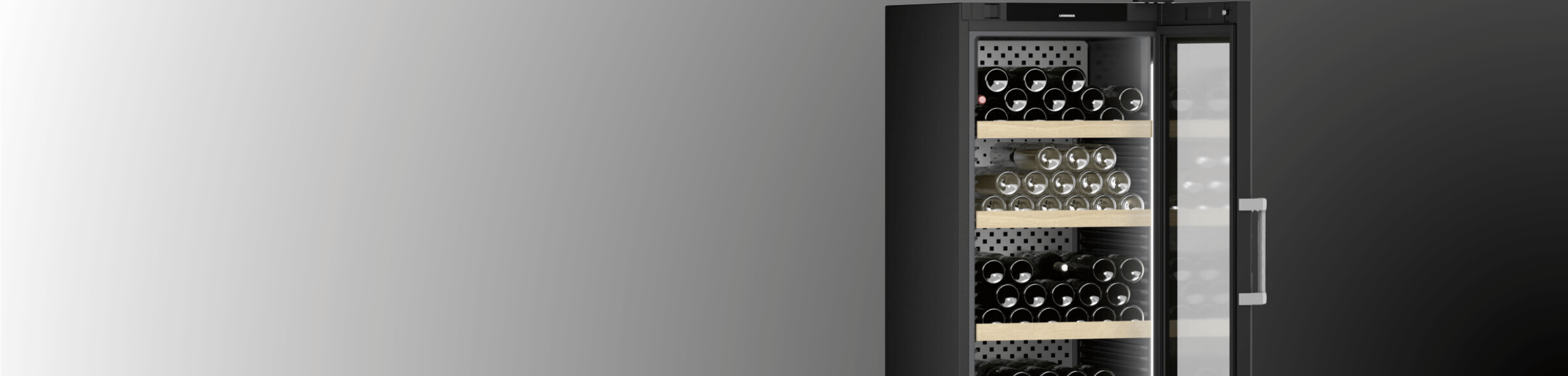 Gradient background with a close up of an open door wine fridge