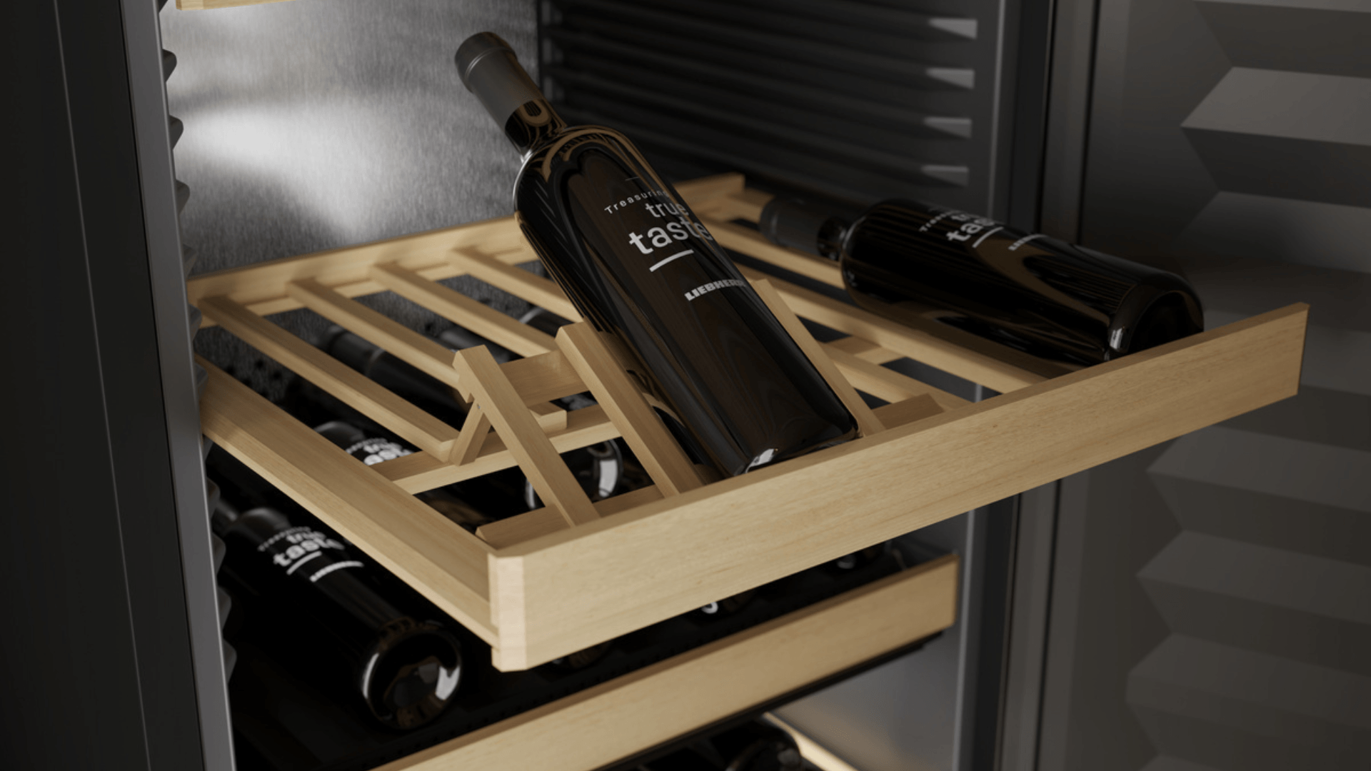 Liebherr wine shelves Interior view of a Liebherr wine fridge with a presentation shelf, propping up a bottle for display.