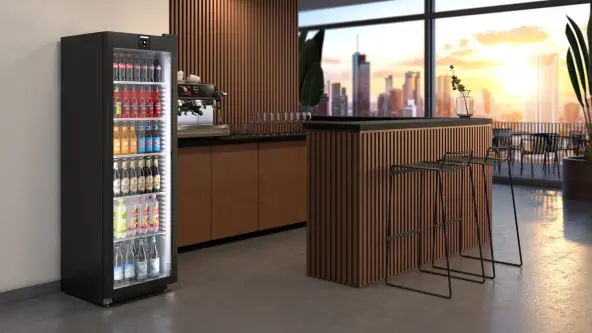 Cafe with view over a modern citiy and beverage fridge on the left side