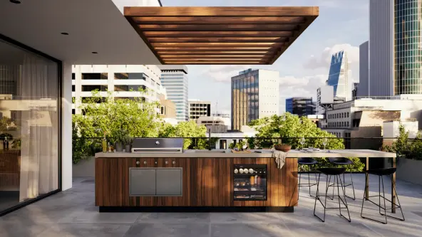Outdoor kitchen with fully integrated outdoor fridge on roof terrace with view of skyscrapers in the background