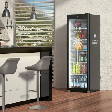 Drinks fridge with glass door and company logos on side and door glass, in a bar setting