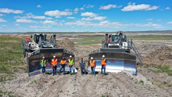 Belle Ayr Mine team standing in front of two white Liebherr PR 776 dozers Image of Belle Ayr Mine team standing in front of two white Liebherr PR 776 dozers